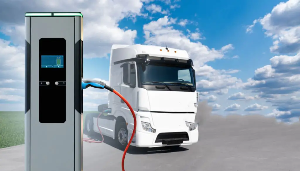 Des batteries de camions électriques en charge à une borne de recharge. Illustration
