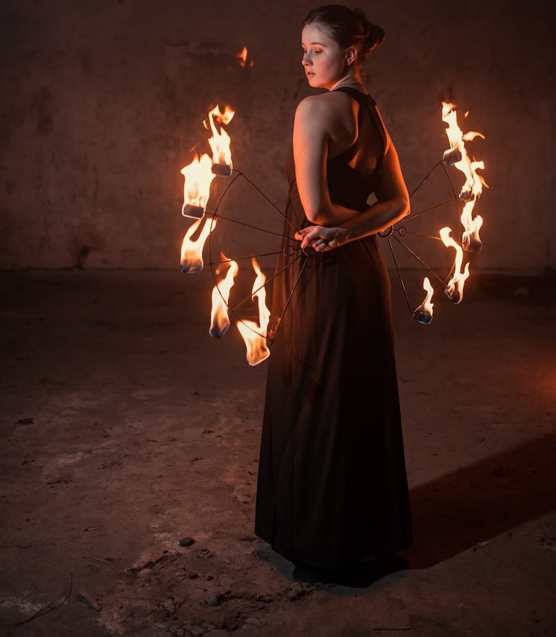 The Slim Girl Who Beats the Drum with Fire – A Symbol of Strength, Art, and Cultural Awakening